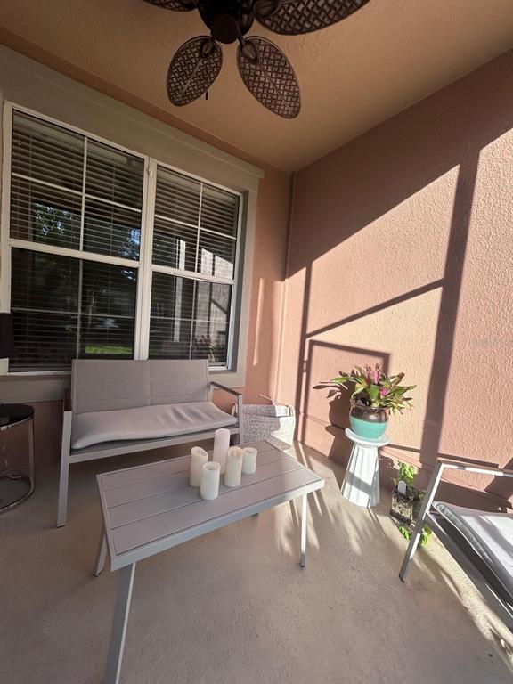 8168 Boat Hook Loop, Unit 107 Windermere, FL 34786 - Photo 13 of 25 a front view of a house with wooden floor and windows