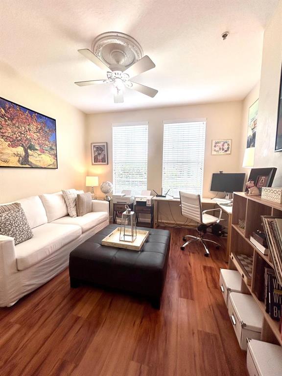 8168 Boat Hook Loop, Unit 107 Windermere, FL 34786 - Photo 14 of 25 a living room with furniture or couch and a large window