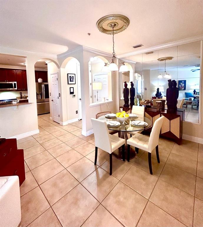 8168 Boat Hook Loop, Unit 107 Windermere, FL 34786 - Photo 10 of 25 a view of a dining room with furniture