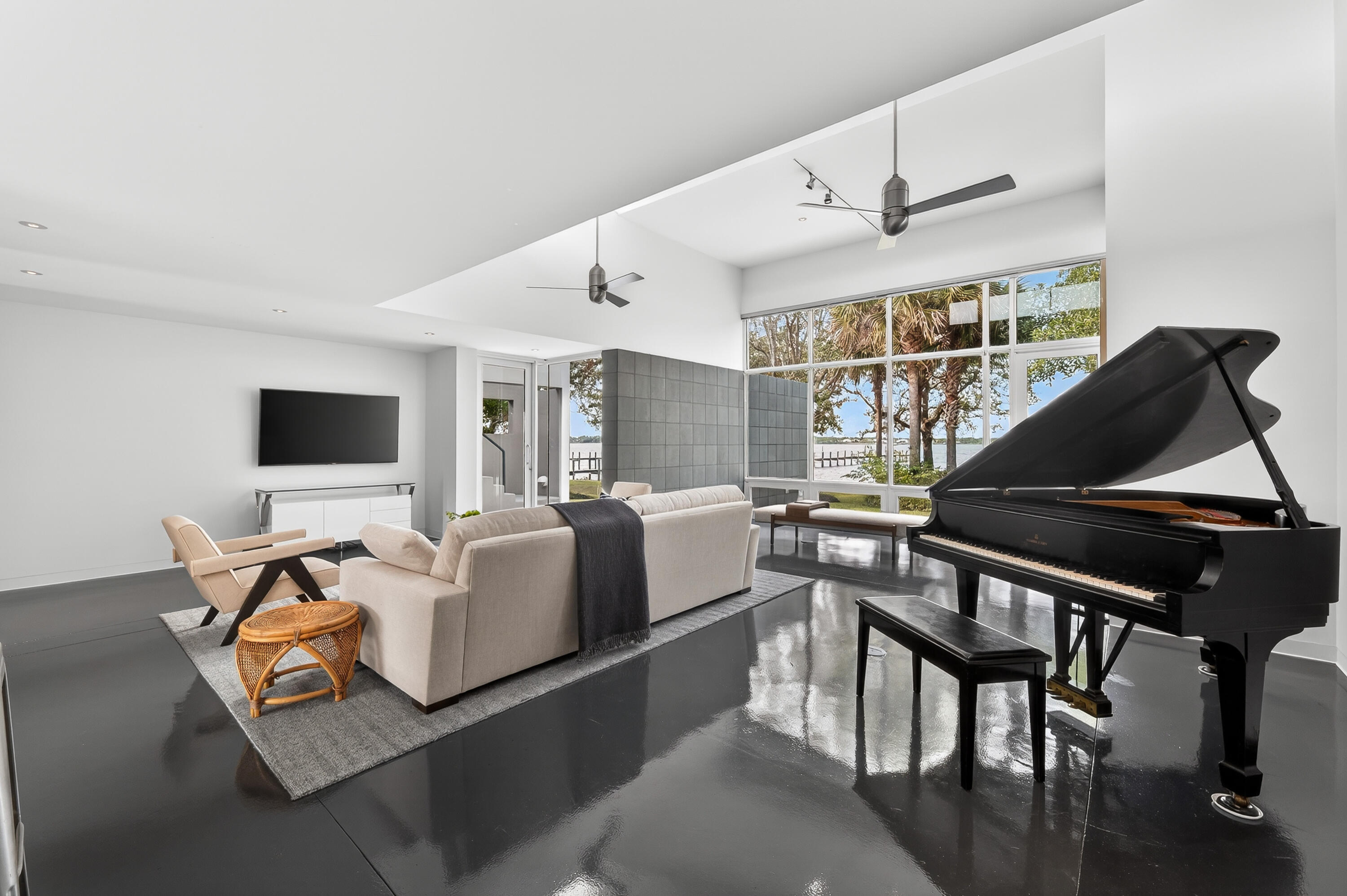 1924 Northwest Shore Terrace Stuart, FL 34994 - Photo 14 of 33 a living room with furniture and a flat screen tv