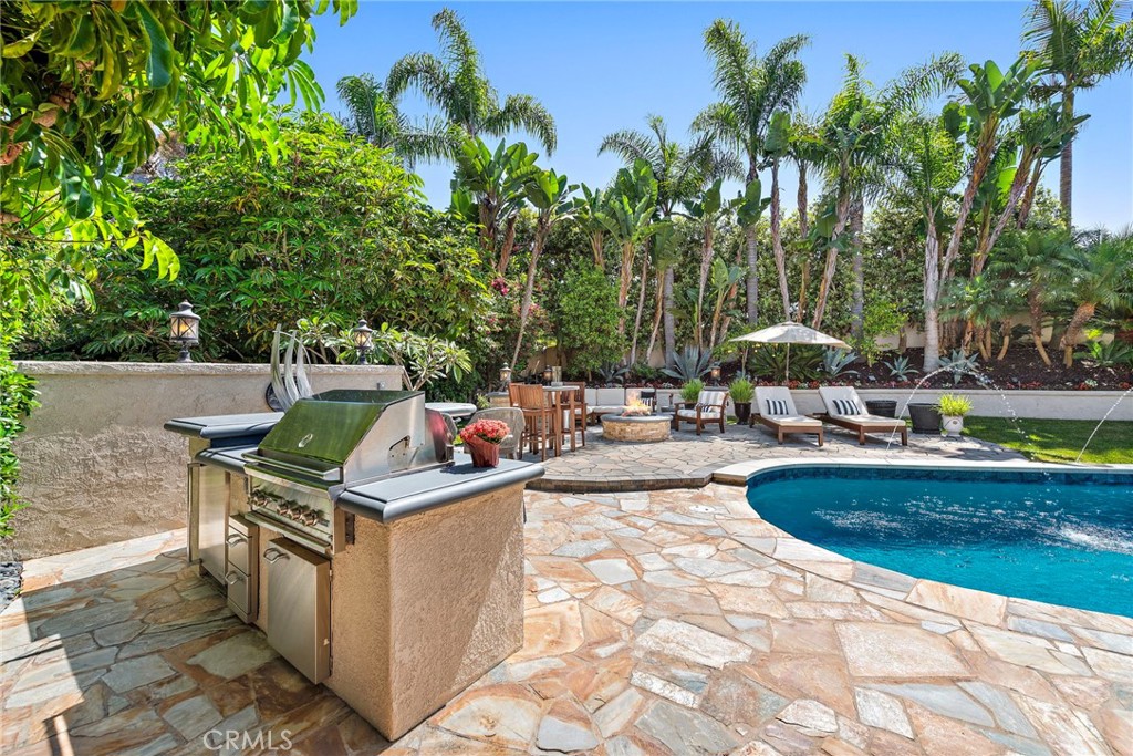 20 Regina Dana Point, CA 92629 - Photo 12 of 26 a view of a kitchen with swimming pool and sitting area