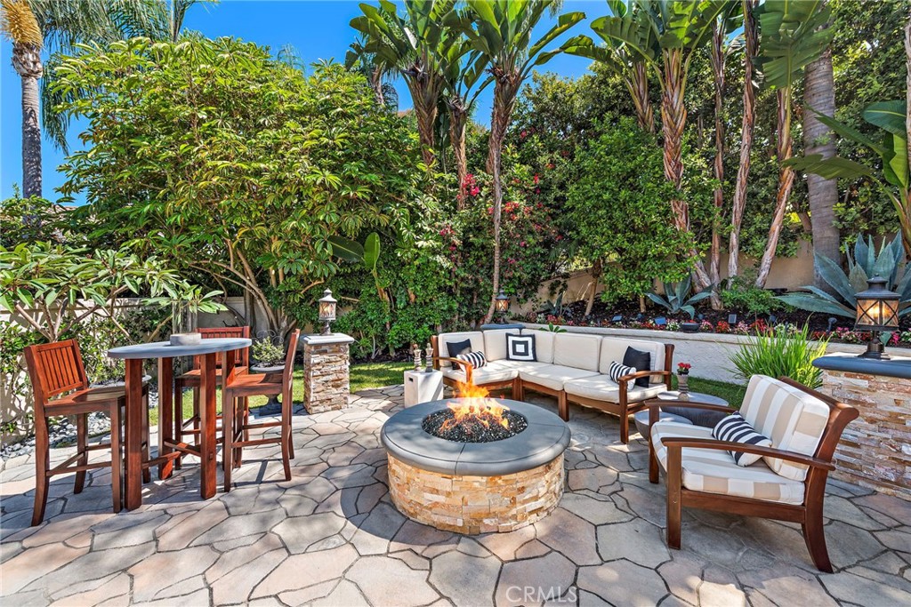 20 Regina Dana Point, CA 92629 - Photo 13 of 26 a view of a patio with chairs and plants