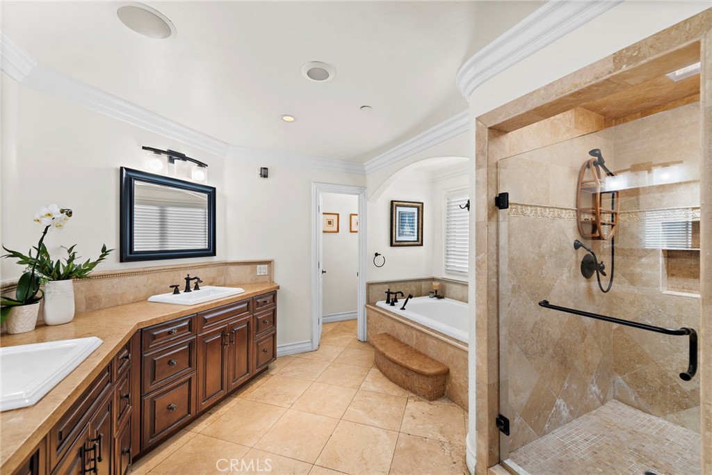 20 Regina Dana Point, CA 92629 - Photo 17 of 26 a spacious bathroom with a tub sink and mirror
