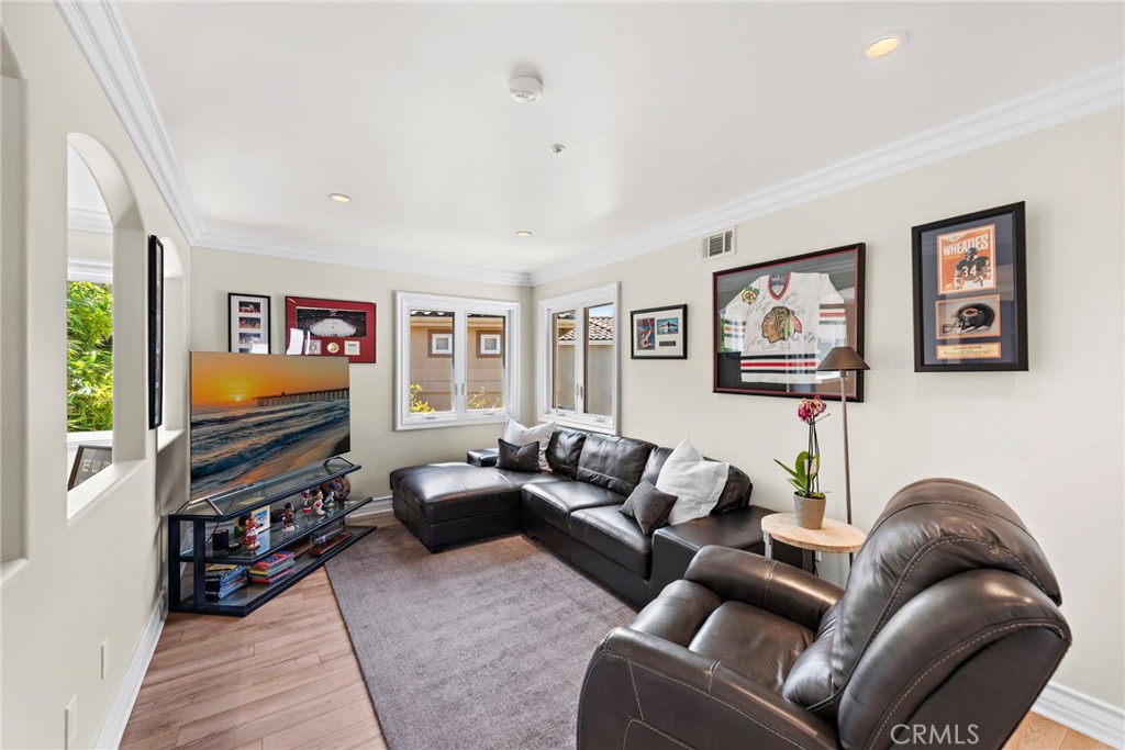 20 Regina Dana Point, CA 92629 - Photo 18 of 26 a living room with furniture and a flat screen tv