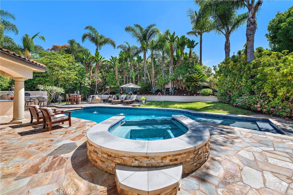 20 Regina Dana Point, CA 92629 - Photo 2 of 26 a view of swimming pool with lawn chairs and plants