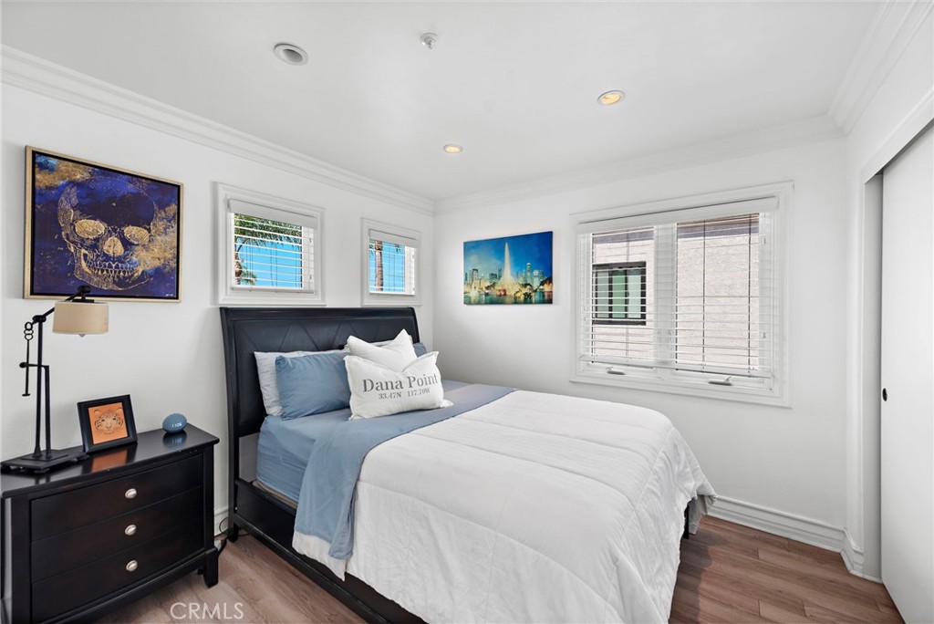 20 Regina Dana Point, CA 92629 - Photo 21 of 26 a bedroom with a bed and a window