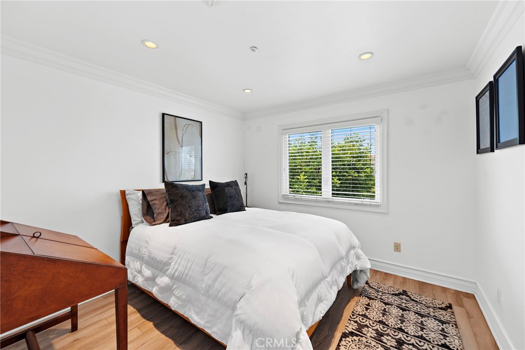 20 Regina Dana Point, CA 92629 - Photo 23 of 26 a bedroom with a bed and a window