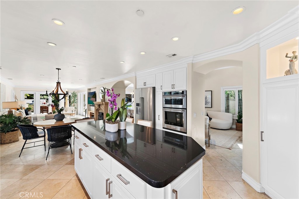20 Regina Dana Point, CA 92629 - Photo 8 of 26 a kitchen with stainless steel appliances granite countertop a sink and a counter top space