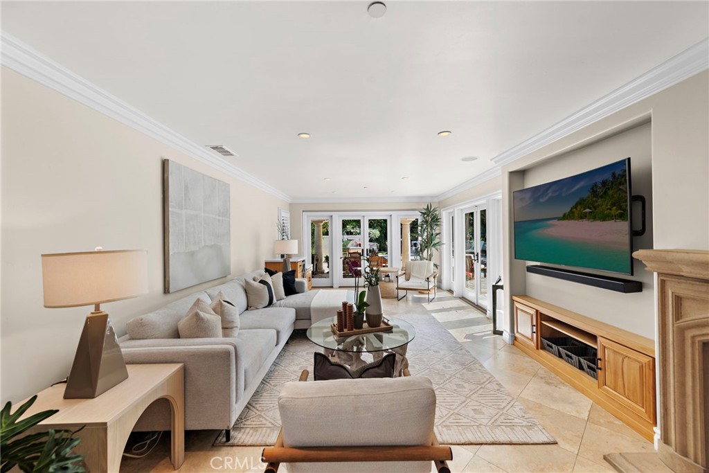 20 Regina Dana Point, CA 92629 - Photo 9 of 26 a living room with furniture and a flat screen tv