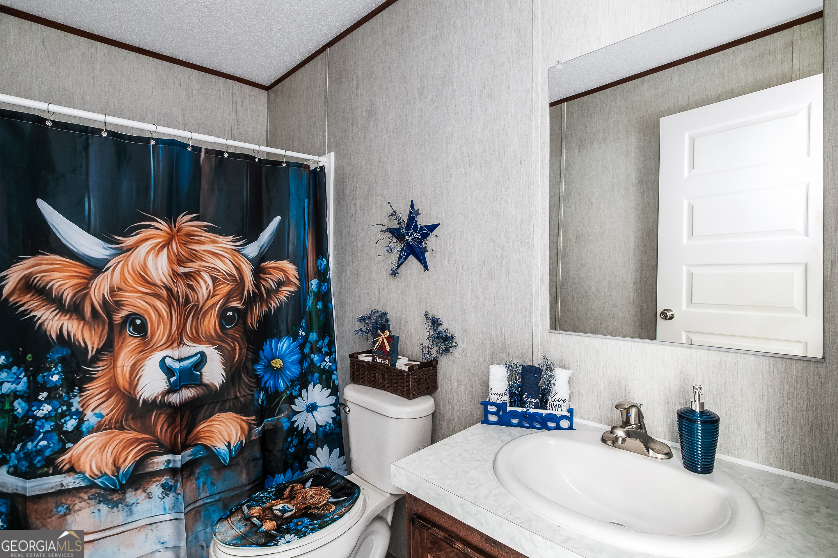 373 Barber Branch St. George, GA 31562 - Photo 14 of 30 a bedroom with a bed and a window