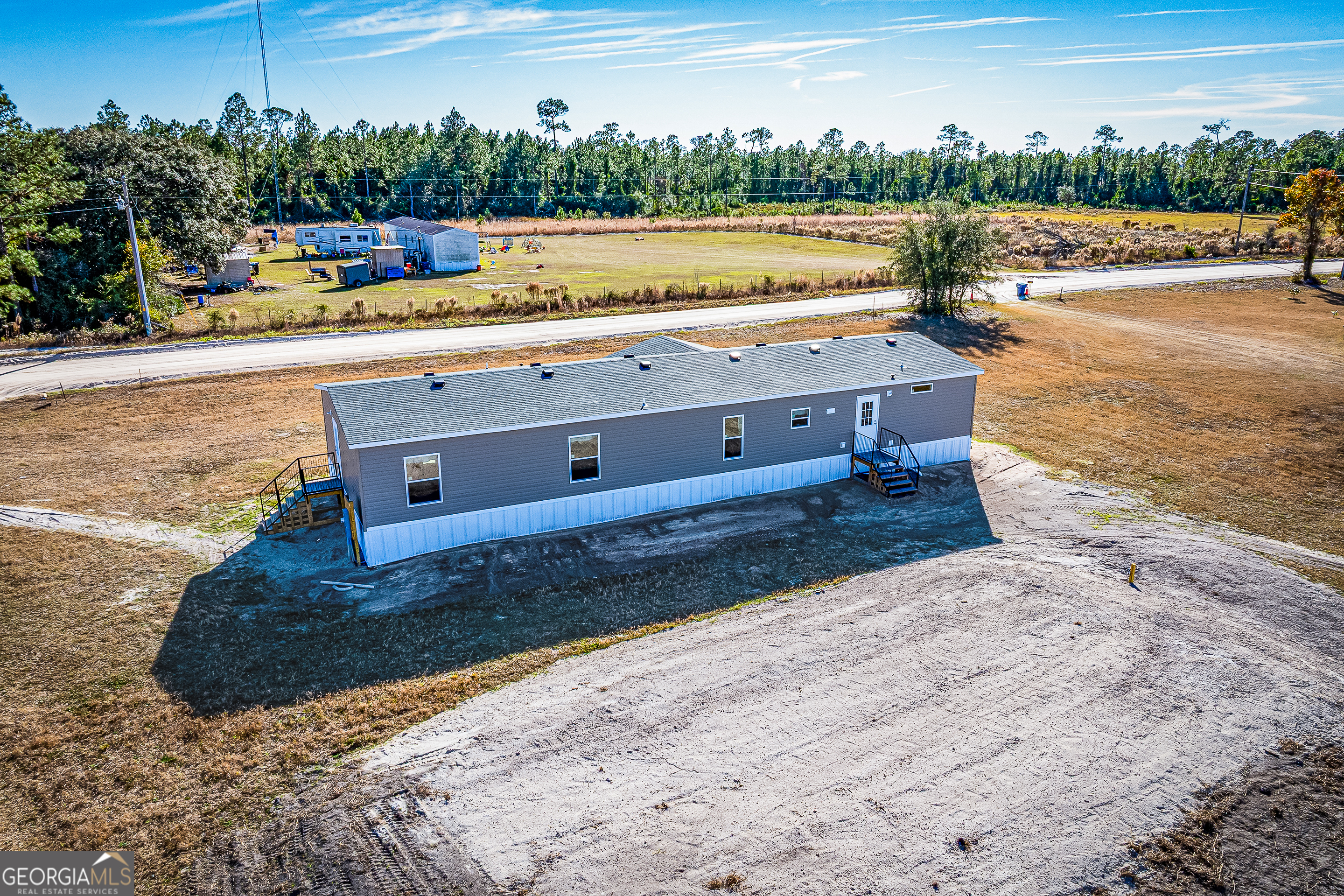 373 Barber Branch St. George, GA 31562 - Photo 24 of 30 a view of a lake with outdoor space