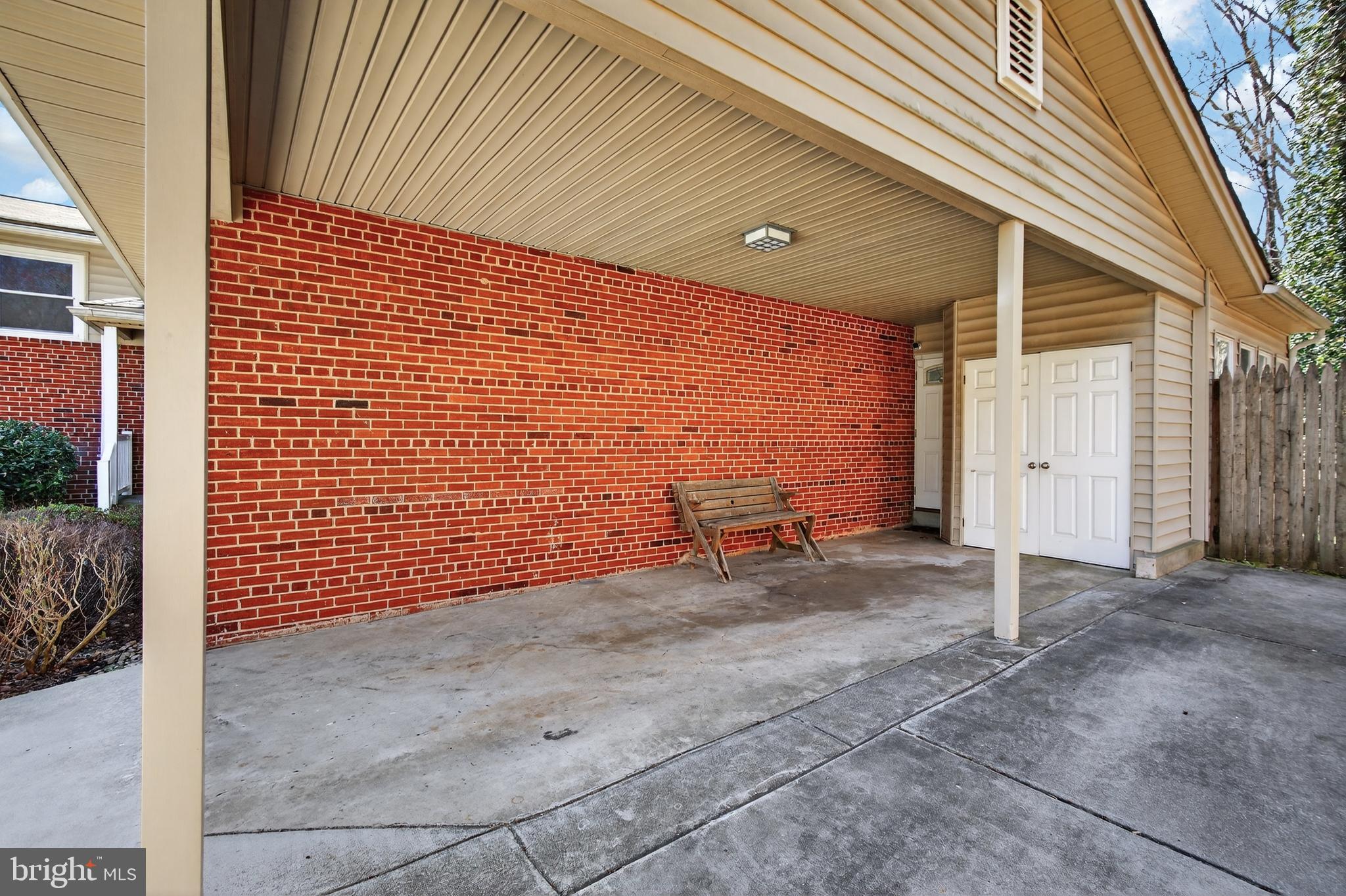 11004 Oakwood Street Silver Spring, MD 20901 - Photo 31 of 35 a view of a garage with wooden wall
