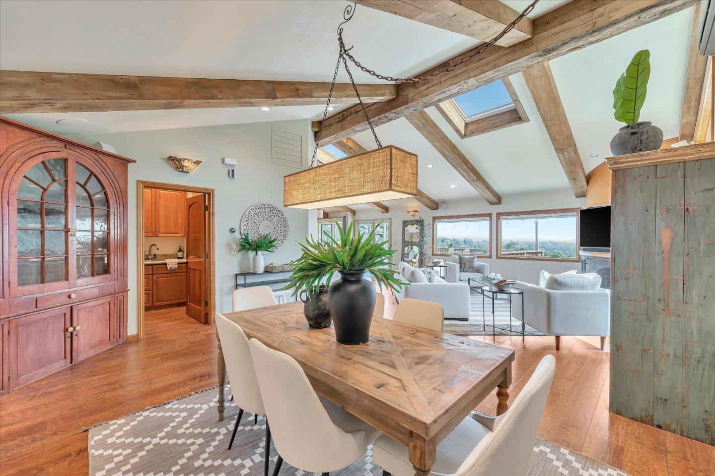 521 Amigo Road Soquel, CA 95073 - Photo 15 of 39 a dining room with furniture and wooden floor