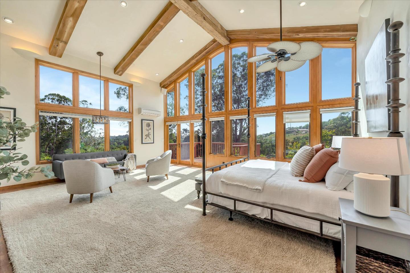 521 Amigo Road Soquel, CA 95073 - Photo 24 of 39 a bedroom with furniture and large windows