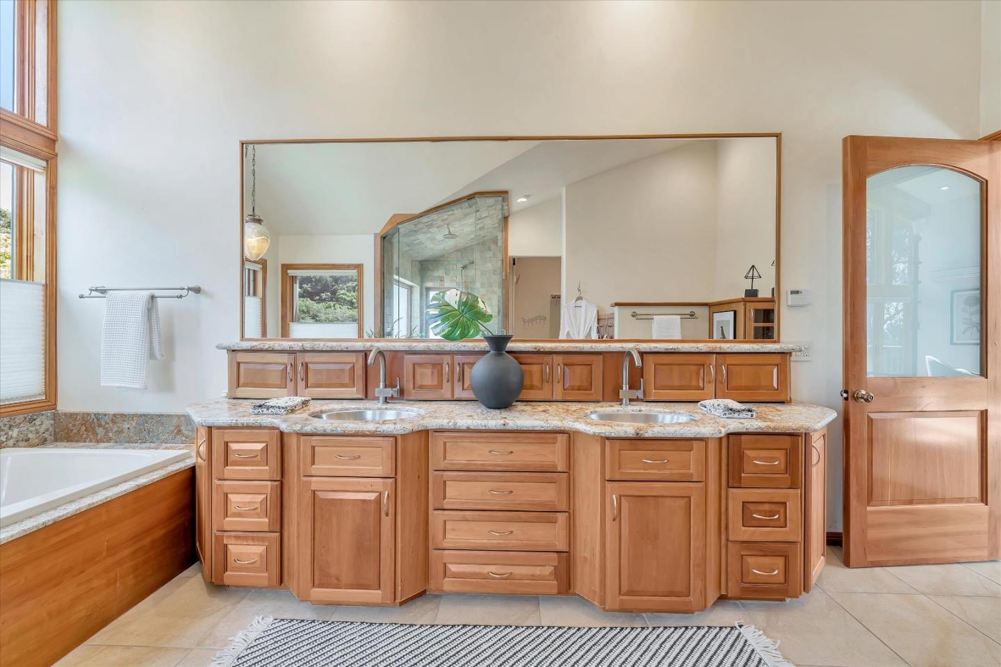 521 Amigo Road Soquel, CA 95073 - Photo 29 of 39 a bathroom with a granite countertop double vanity sink and mirror