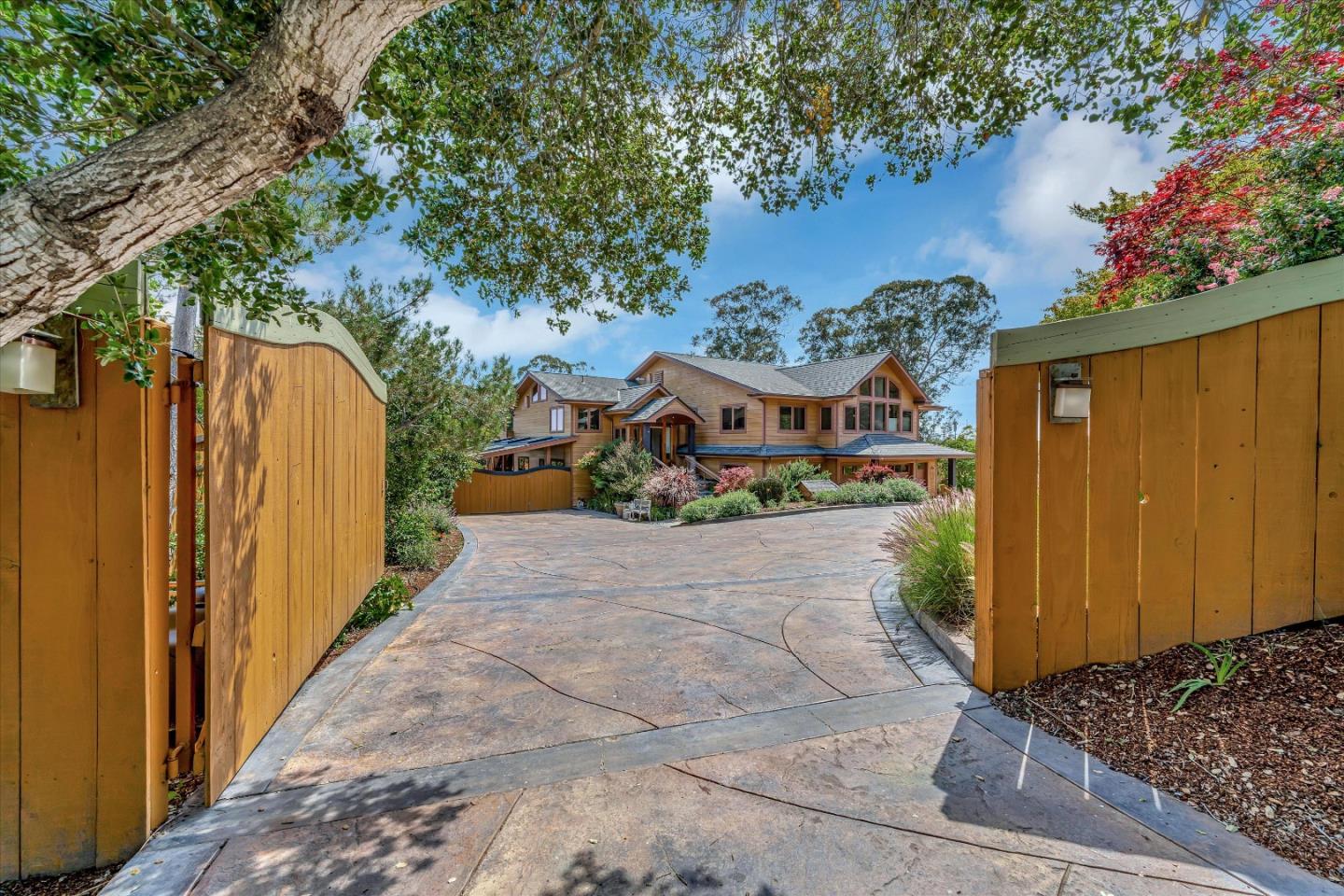 521 Amigo Road Soquel, CA 95073 - Photo 3 of 39 a view of a house with a yard