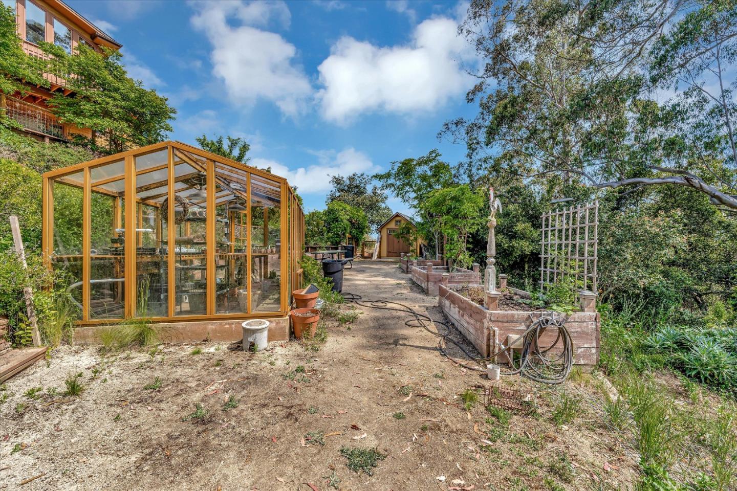521 Amigo Road Soquel, CA 95073 - Photo 32 of 39 a front view of a house with a garden