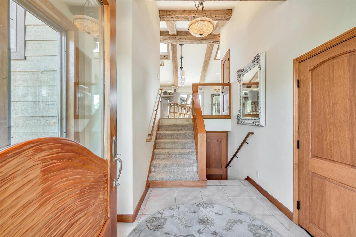 521 Amigo Road Soquel, CA 95073 - Photo 5 of 39 a view of a hallway with wooden floor and staircase