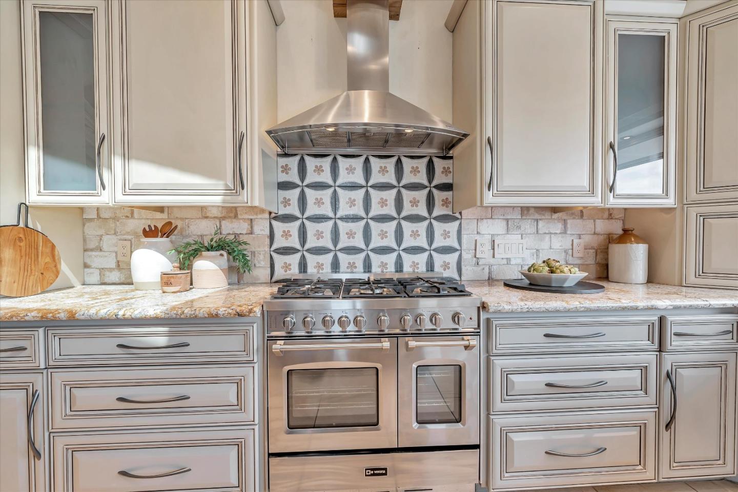 521 Amigo Road Soquel, CA 95073 - Photo 10 of 39 a kitchen with granite countertop white cabinets and white appliances