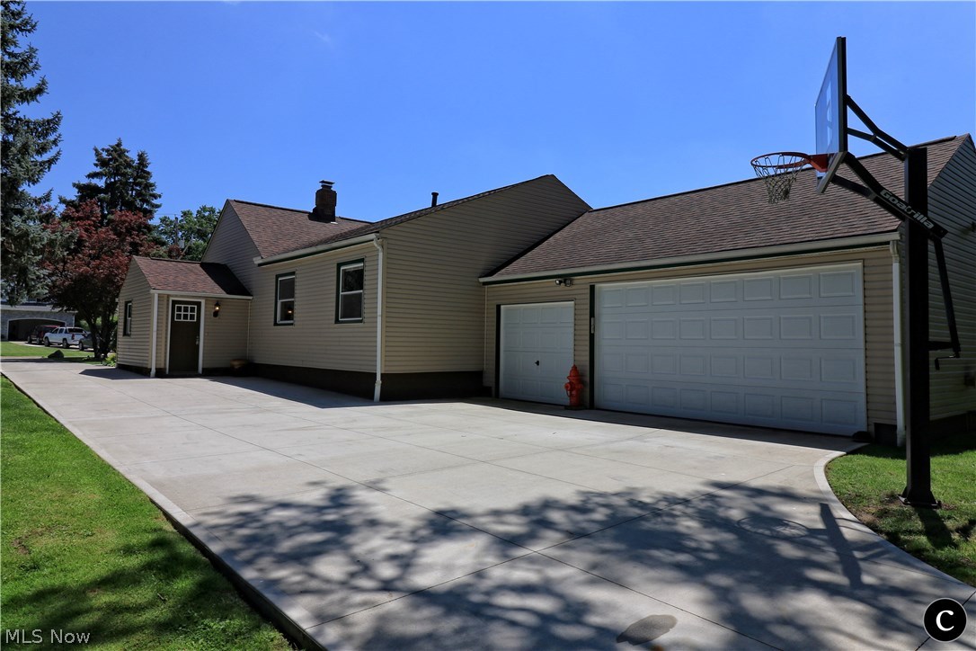 848 Lander Road Cleveland, OH 44143 - Photo 3 of 30 THIS PERFECT 28X23 3 CAR GARAGE WITH A 1/2 BATH WOULD BE IDEAL FOR ANY TOYS OR SPORTSCARS