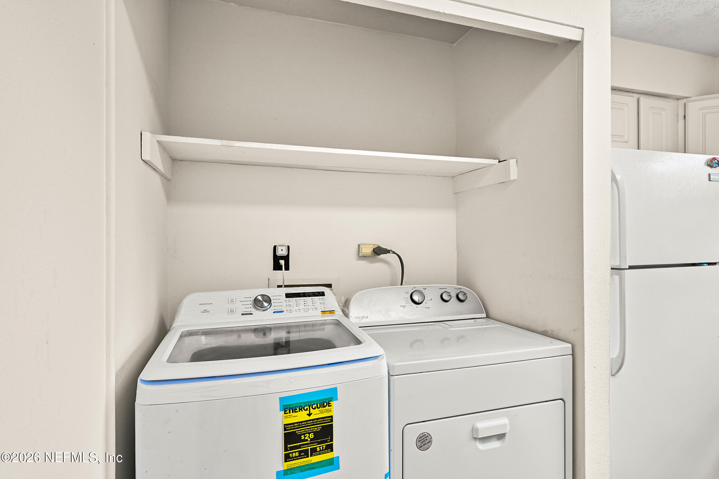 4915 Baymeadows Road, Unit 6G Jacksonville, FL 32217 - Photo 29 of 44 a utility room with dryer and washer