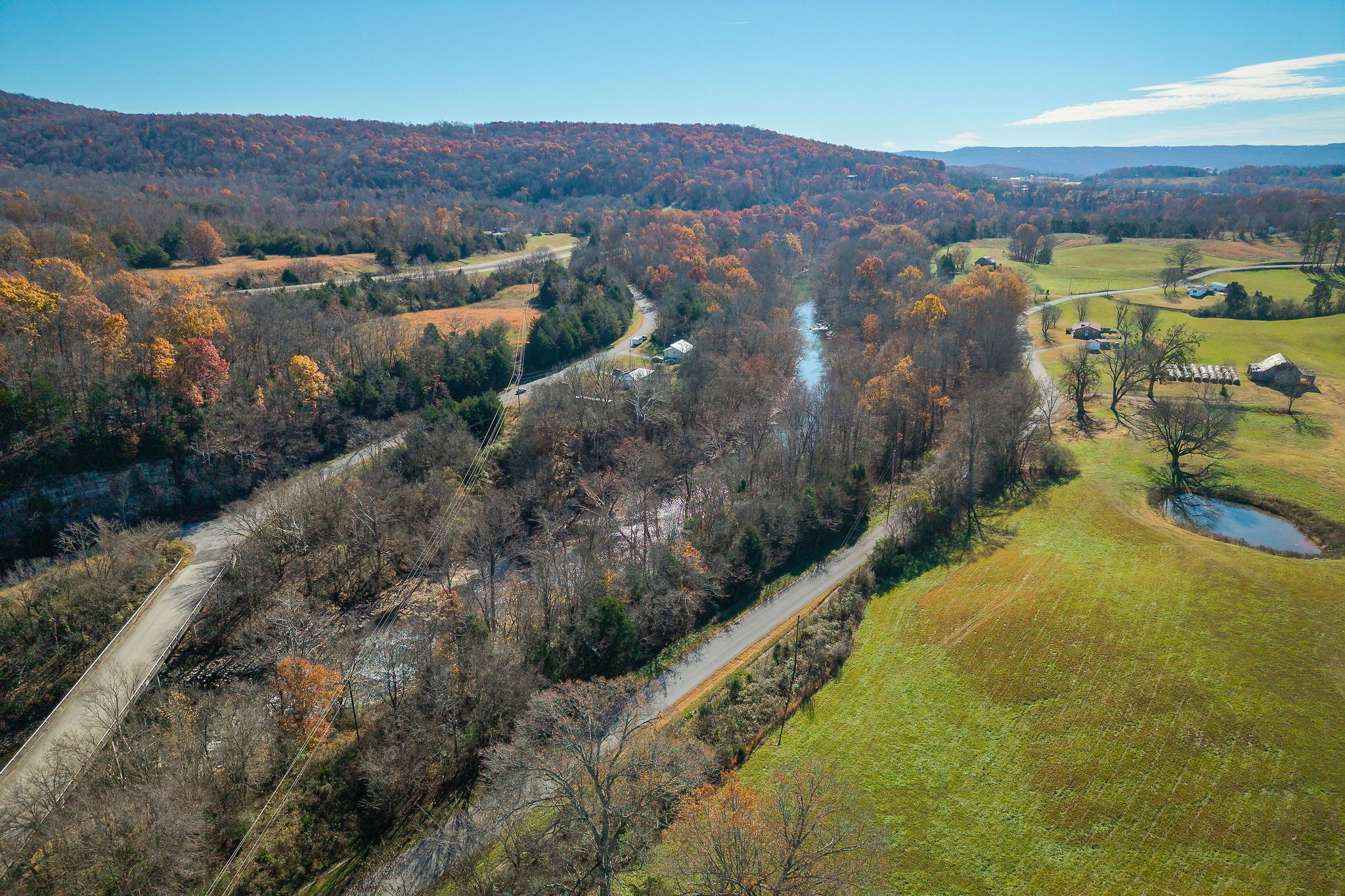 0 Simmons Road Sparta, TN 38583 - Photo 15 of 18 a view of a lush green hillside and a houses