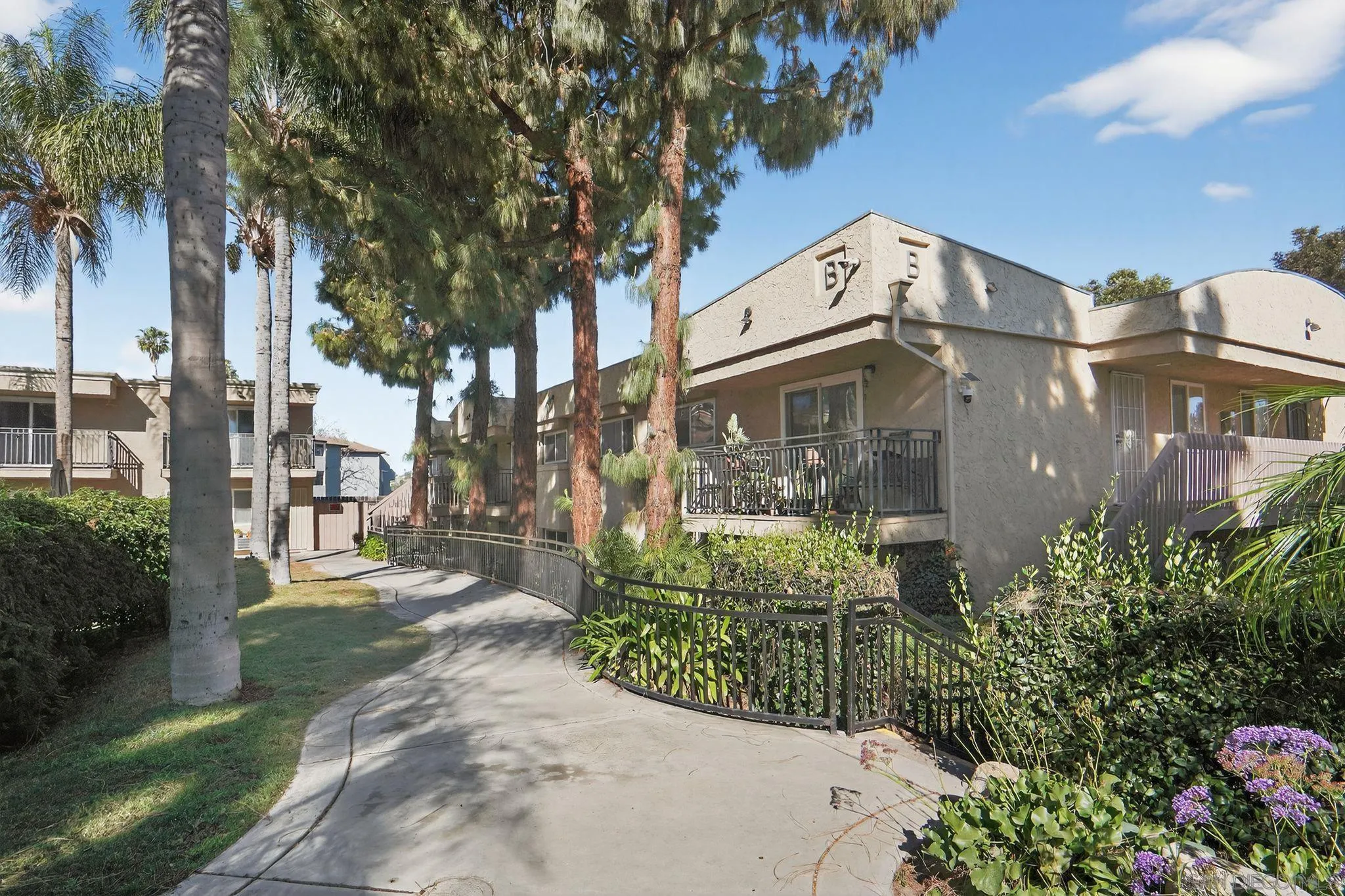 9860 Dale Avenue, Unit B9 Spring Valley, CA 91977 - Photo 23 of 31 a view of a street with a building in the background