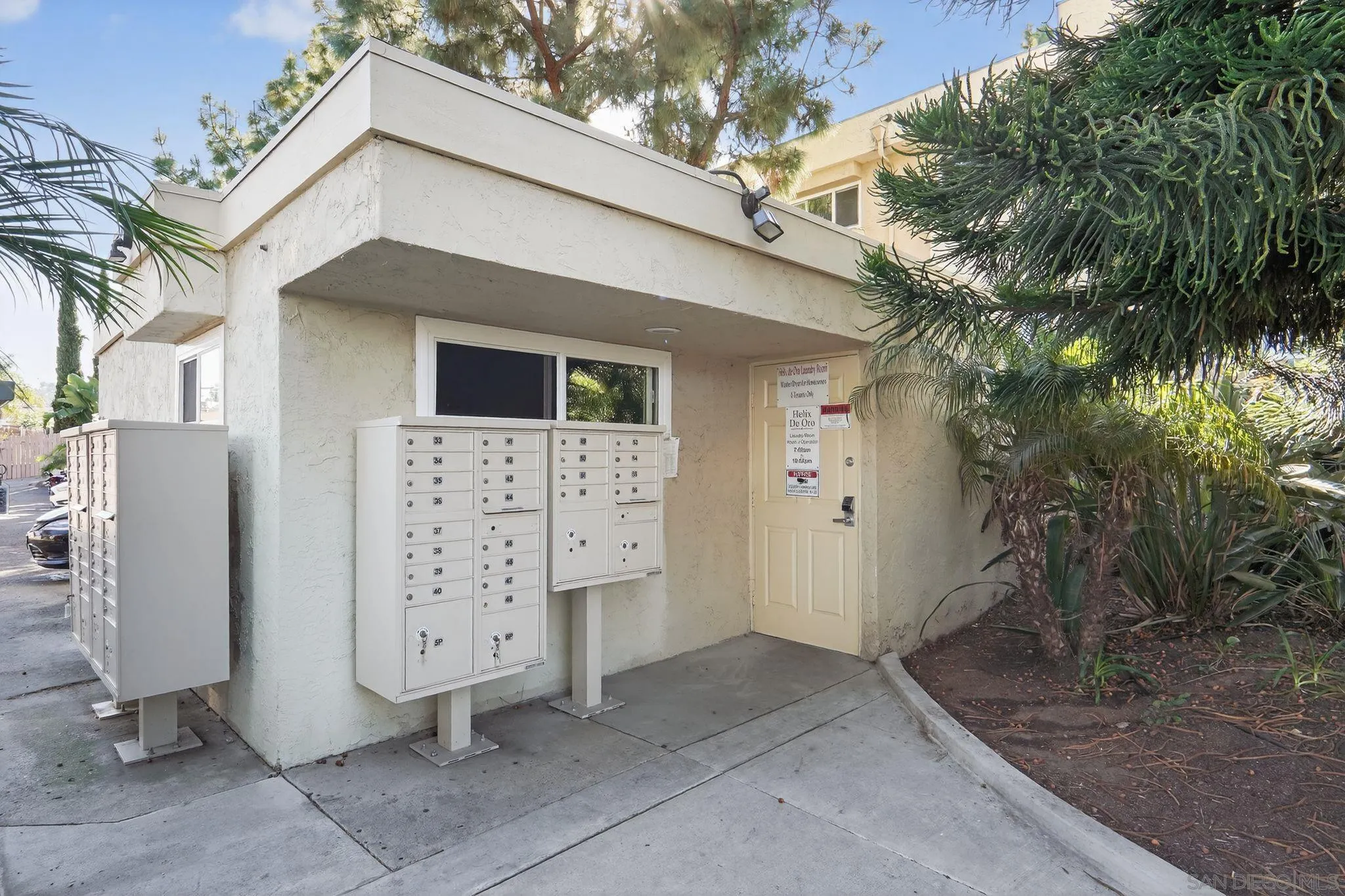 9860 Dale Avenue, Unit B9 Spring Valley, CA 91977 - Photo 27 of 31 a view of a house with a yard