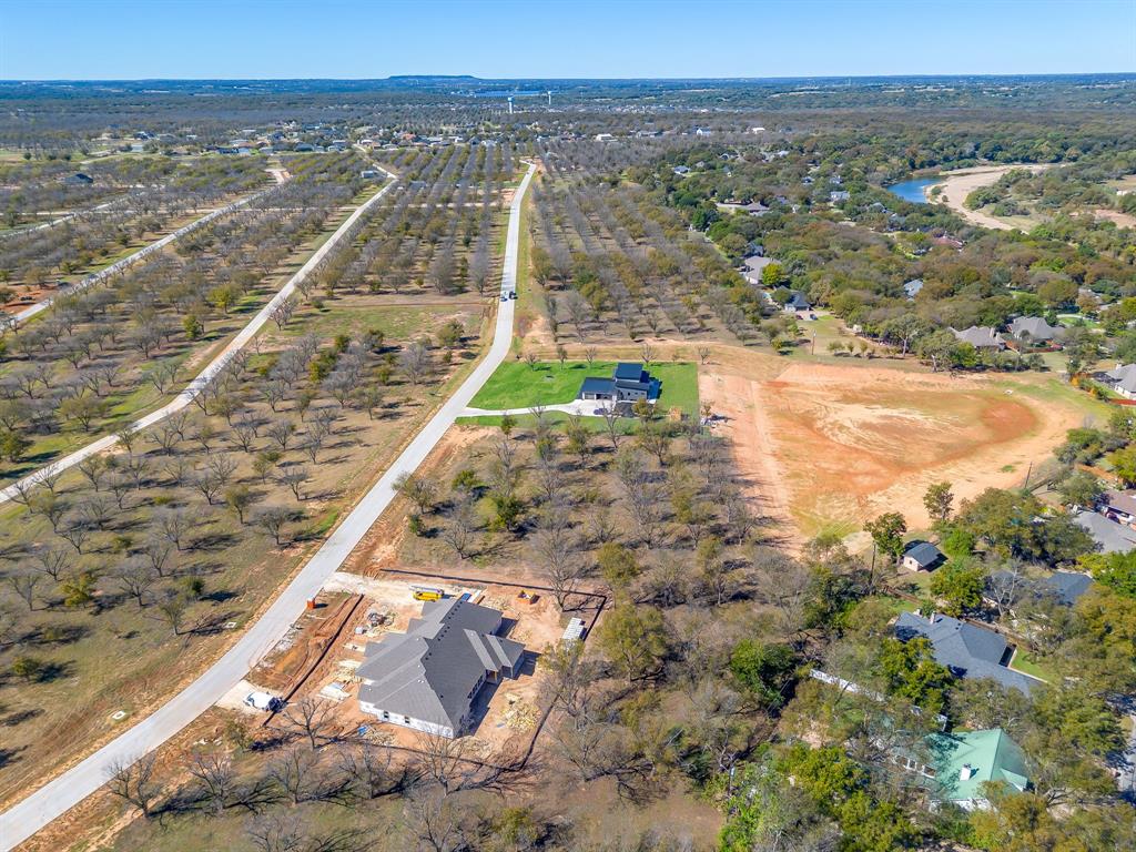 1148 West Landings Road North Granbury, TX 76049 - Photo 5 of 36 a view of a city with an ocean view