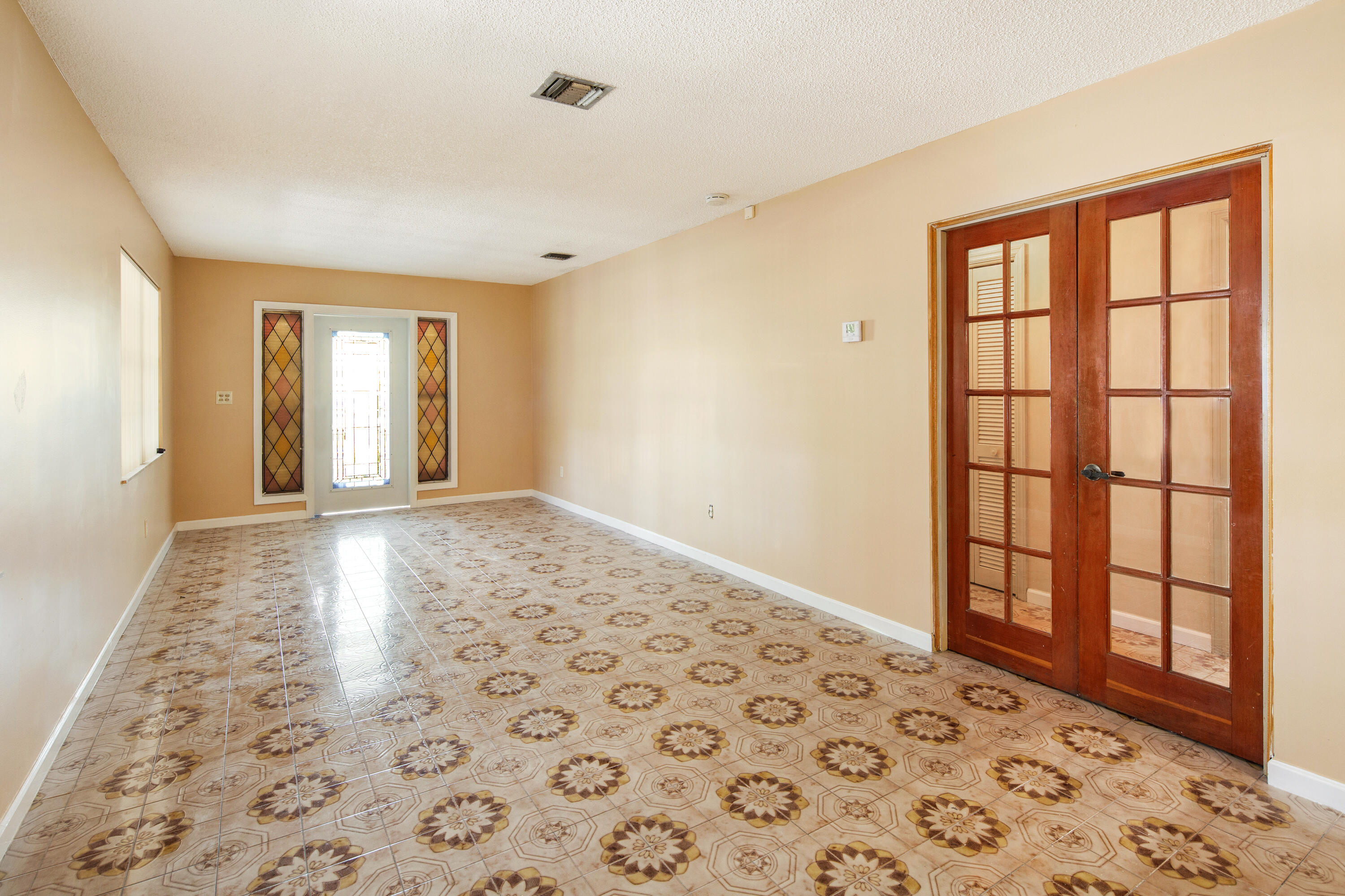 1612 Washington Street Key West, FL 33040 - Photo 16 of 38 a big room with windows and closet