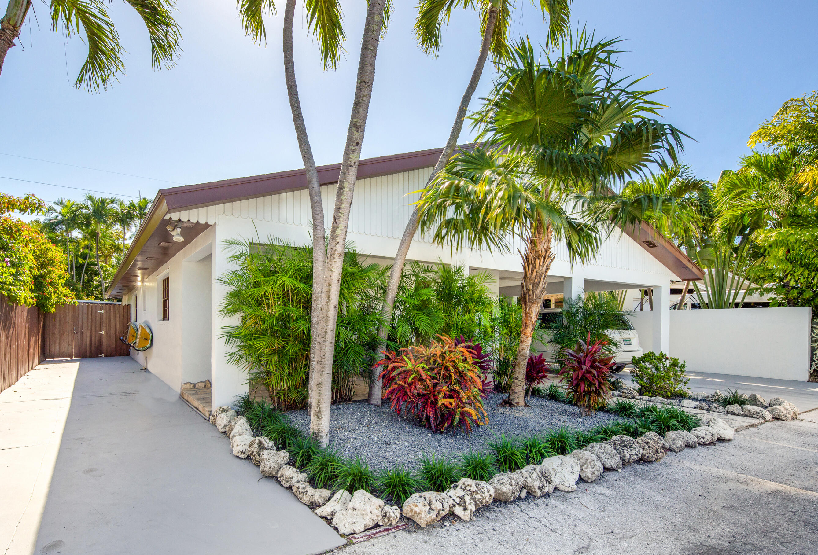 1612 Washington Street Key West, FL 33040 - Photo 2 of 38 front view of a house with a patio