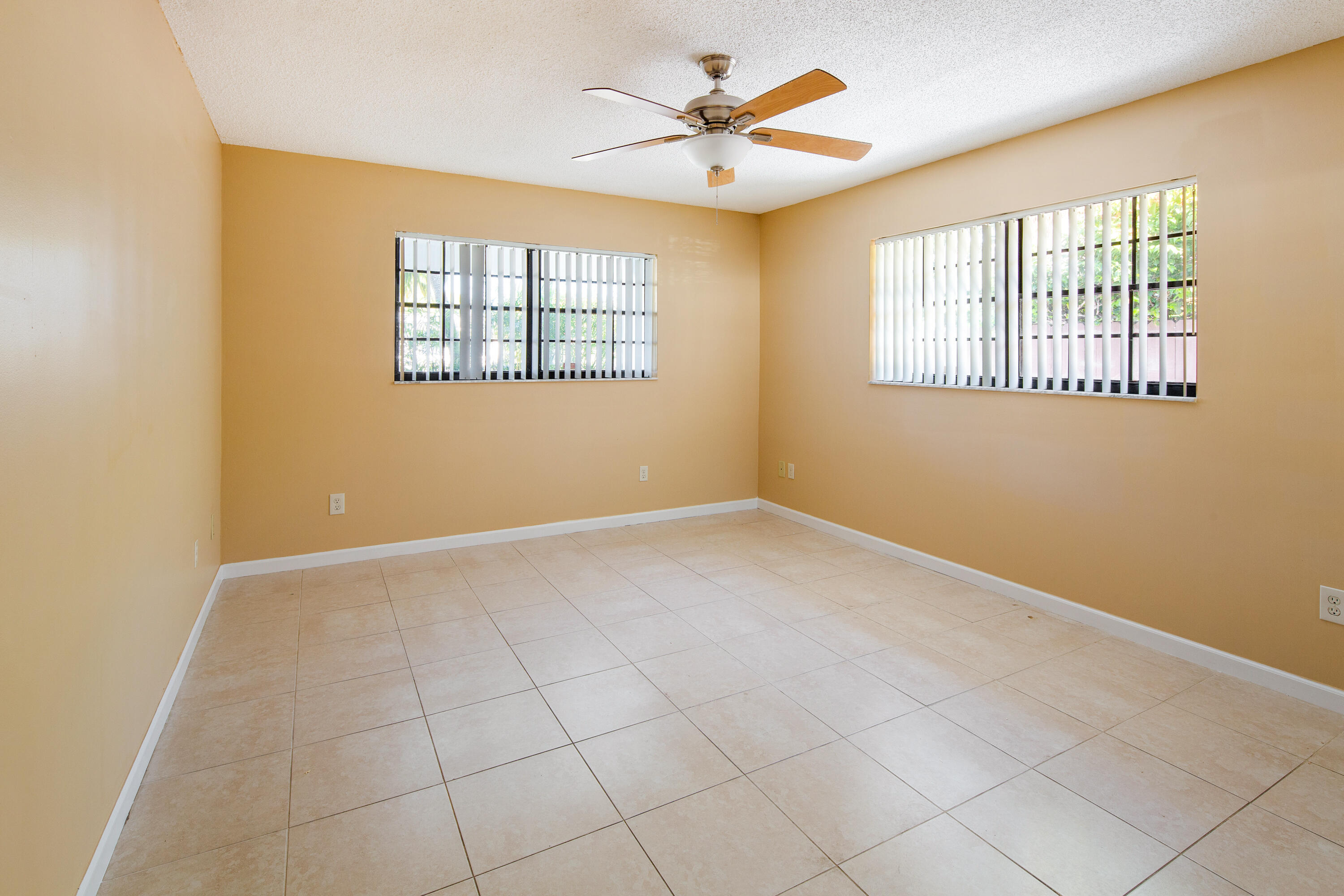 1612 Washington Street Key West, FL 33040 - Photo 23 of 38 a view of an empty room with a window