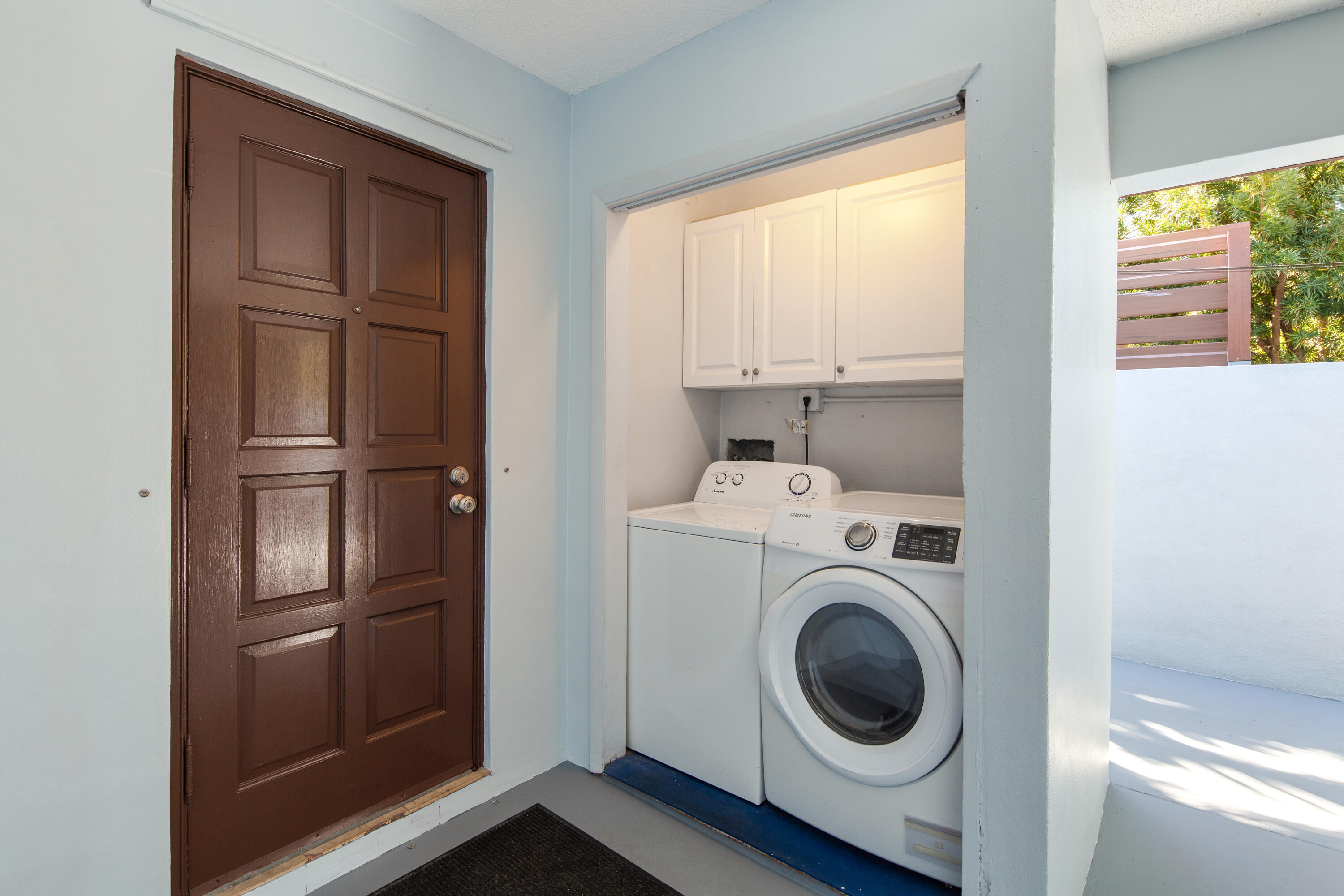 1612 Washington Street Key West, FL 33040 - Photo 24 of 38 a utility room with dryer and washer