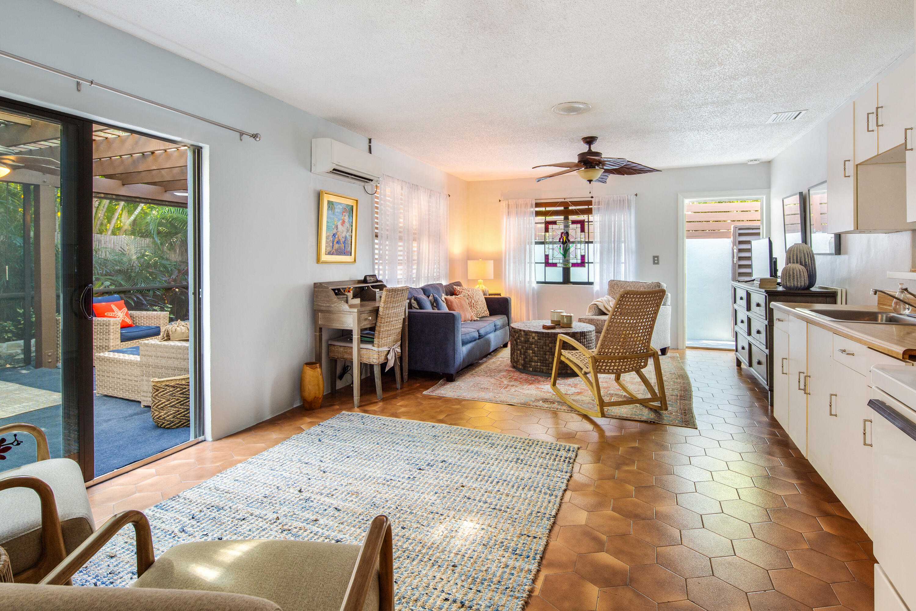 1612 Washington Street Key West, FL 33040 - Photo 27 of 38 a living room with furniture and a flat screen tv