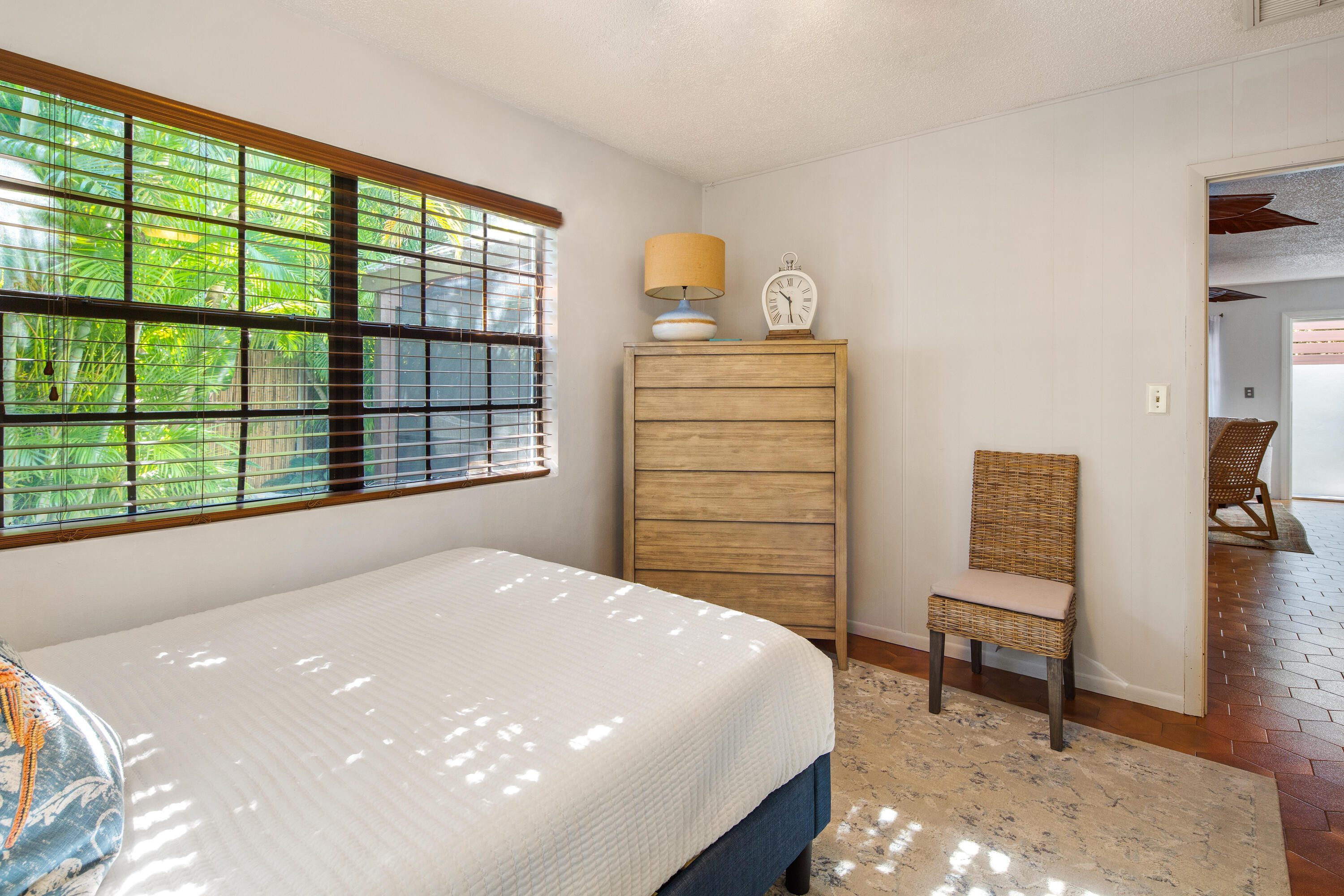 1612 Washington Street Key West, FL 33040 - Photo 31 of 38 a bedroom with a bed and a large window with outer view