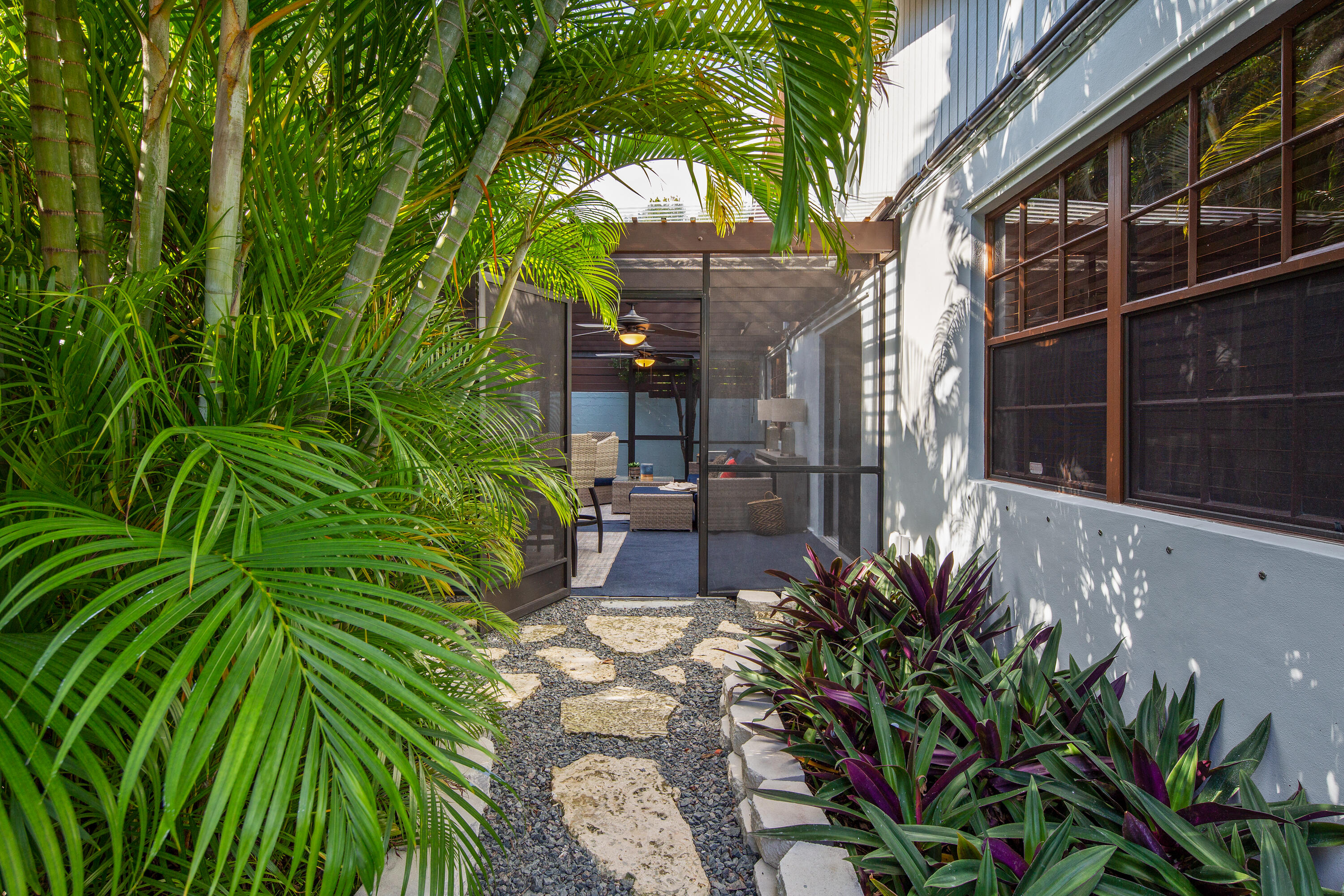 1612 Washington Street Key West, FL 33040 - Photo 36 of 38 a backyard of a house with seating space
