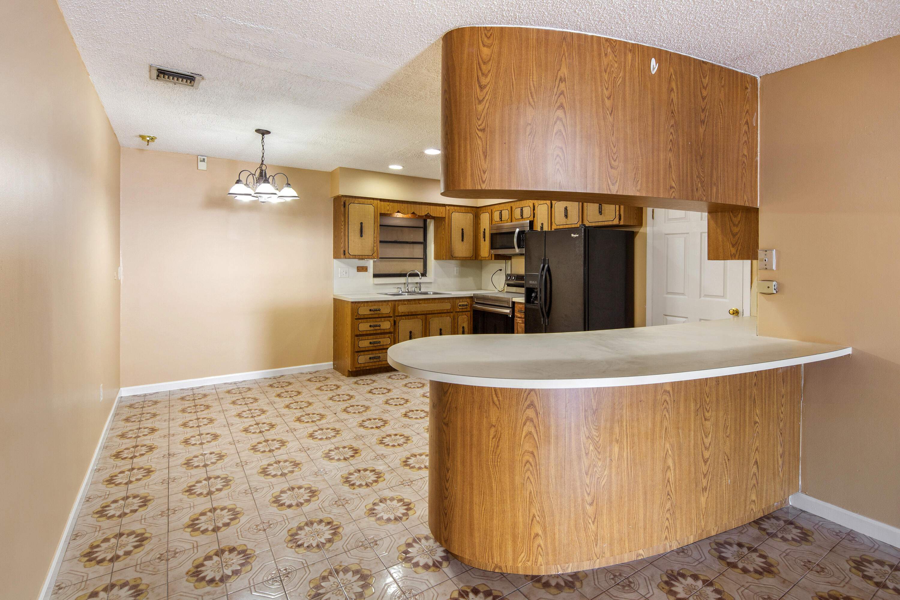 1612 Washington Street Key West, FL 33040 - Photo 9 of 38 a room with a table and chairs