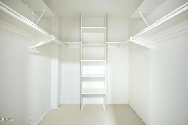 a view of an empty walk in closet