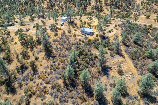 an aerial view of residential house with outdoor space