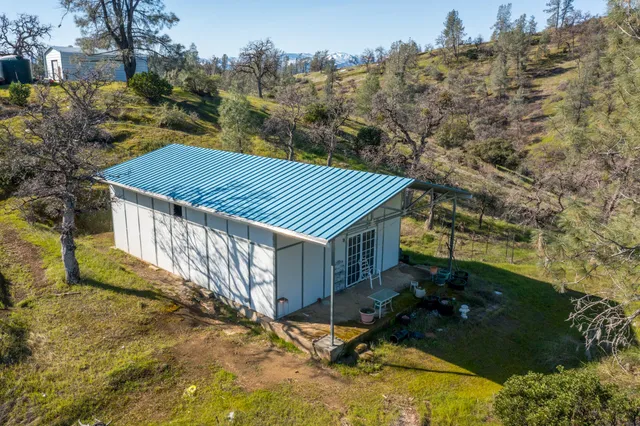 a view of a room with wooden walls