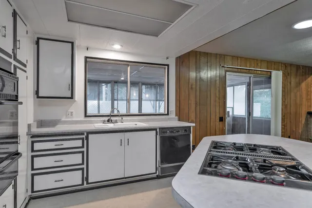 a room with natural light and a large window