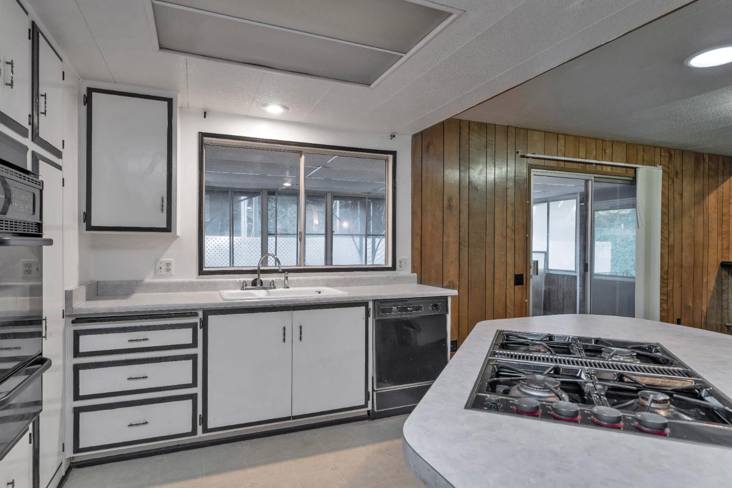3550 China Garden Road, Unit 38 Placerville, CA 95667 - Photo 11 of 18 a kitchen with a stove and cabinets