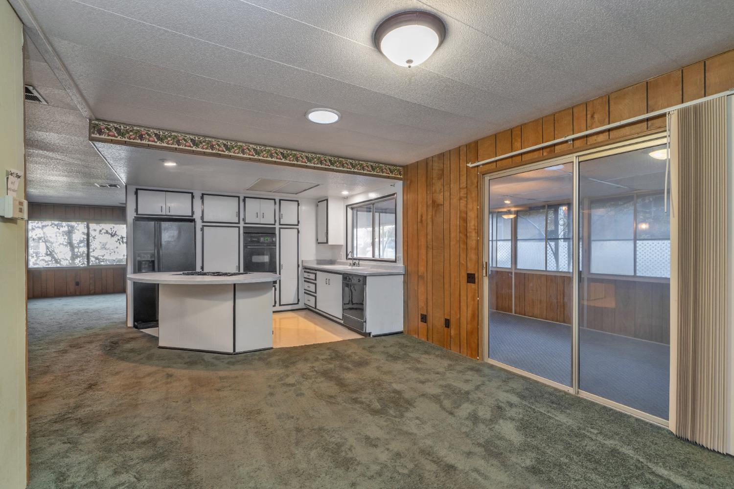 3550 China Garden Road, Unit 38 Placerville, CA 95667 - Photo 13 of 18 a view of kitchen with refrigerator and window