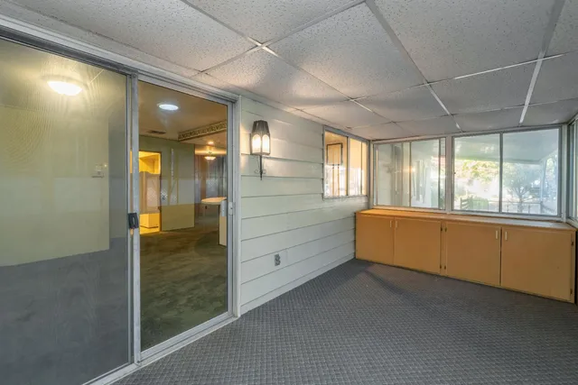 a bathroom with a large tub and shower