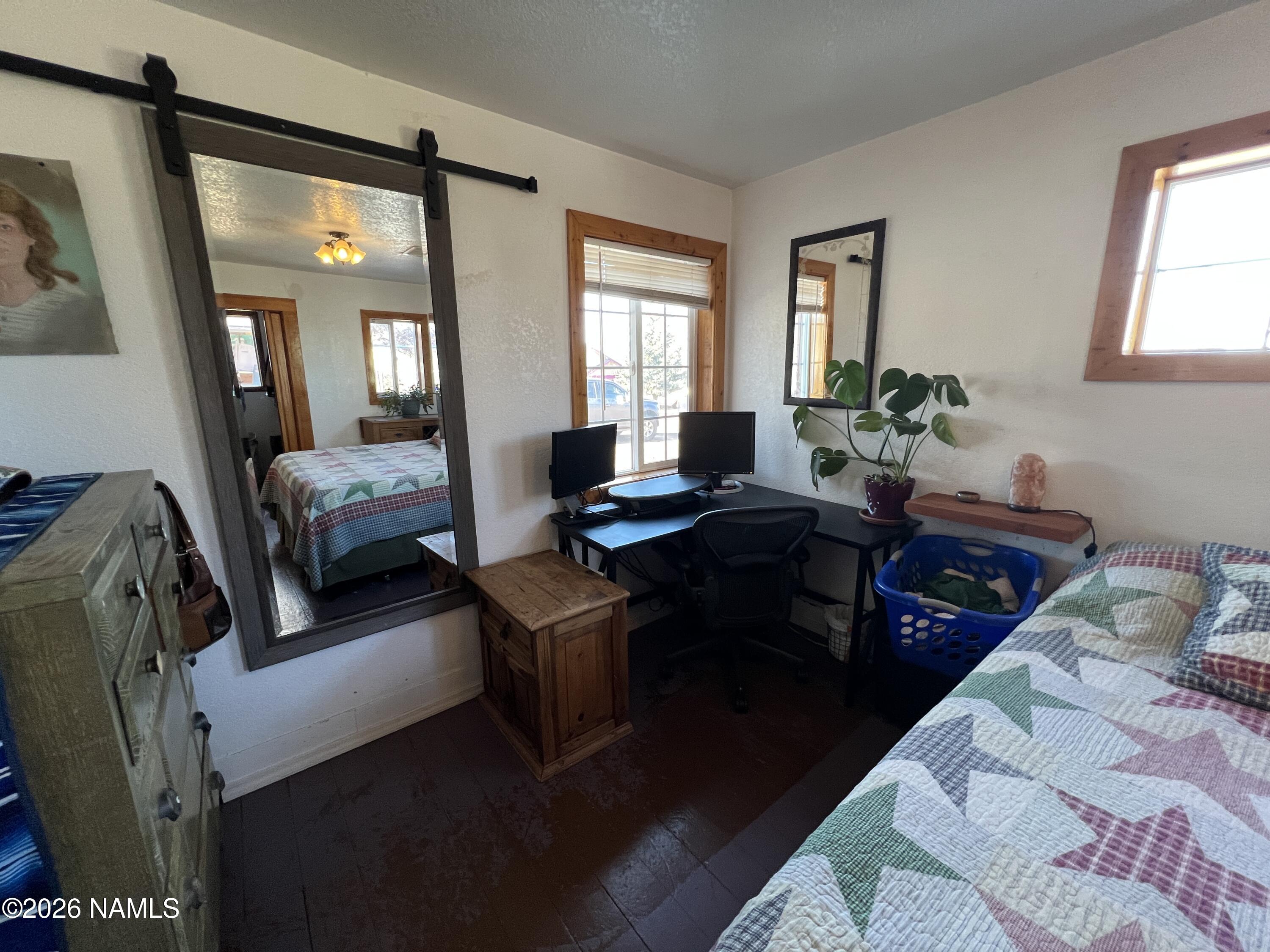 407 South 4th Street Williams, AZ 86046 - Photo 15 of 25 a living room with furniture and a large window
