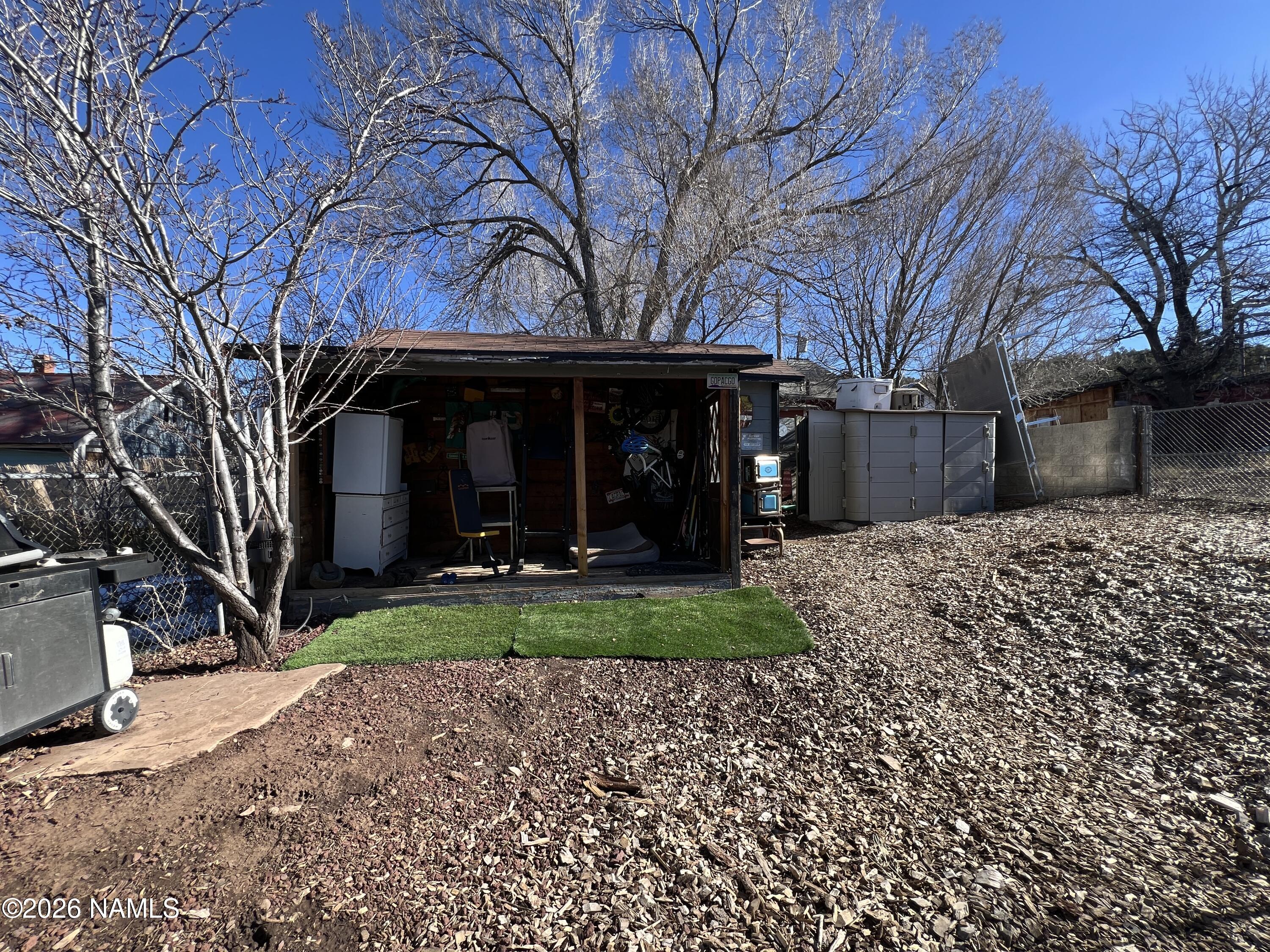 407 South 4th Street Williams, AZ 86046 - Photo 24 of 25 a view of a house with a yard