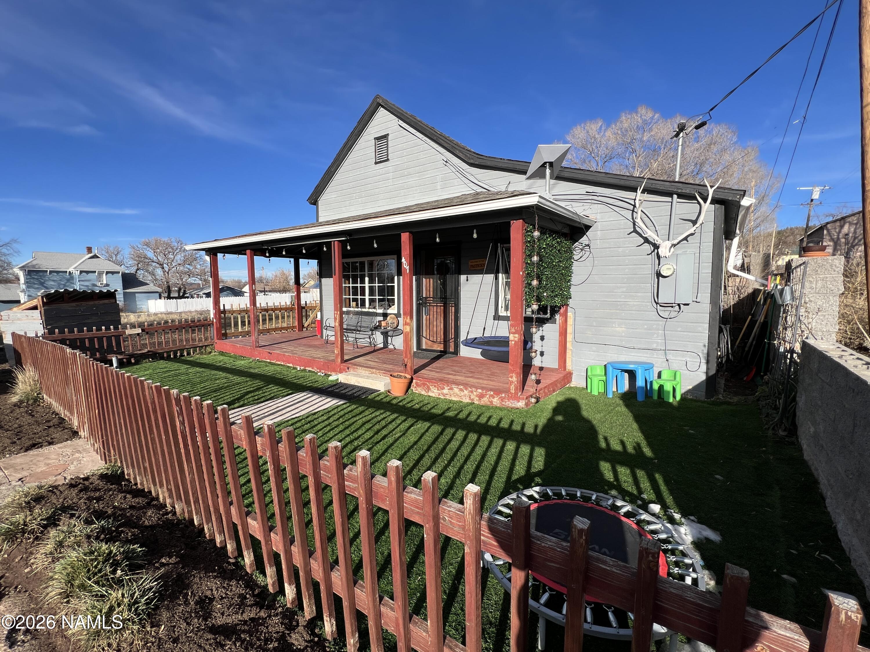 407 South 4th Street Williams, AZ 86046 - Photo 3 of 25 a front view of a house with balcony