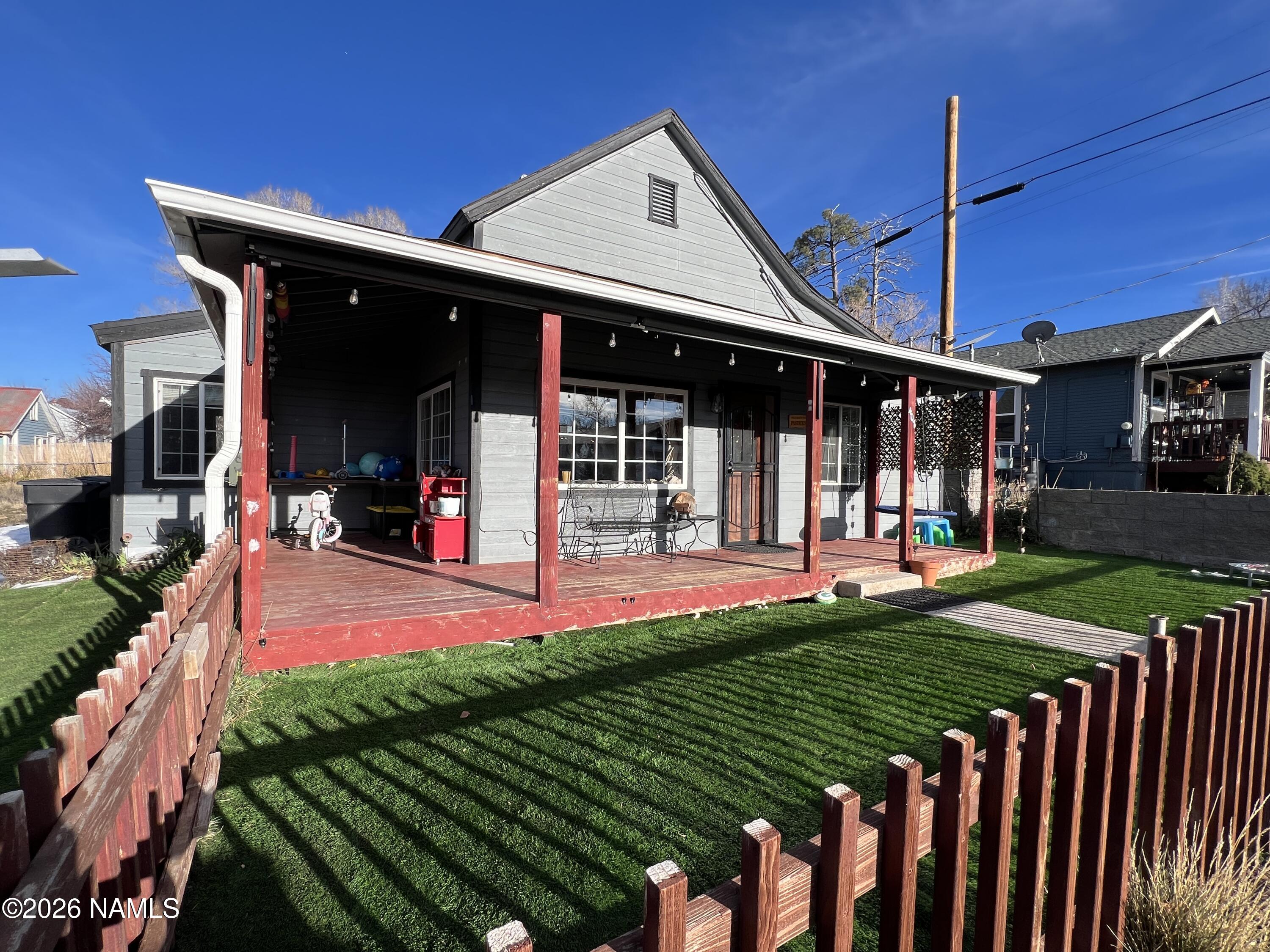 407 South 4th Street Williams, AZ 86046 - Photo 4 of 25 a front view of a house having patio