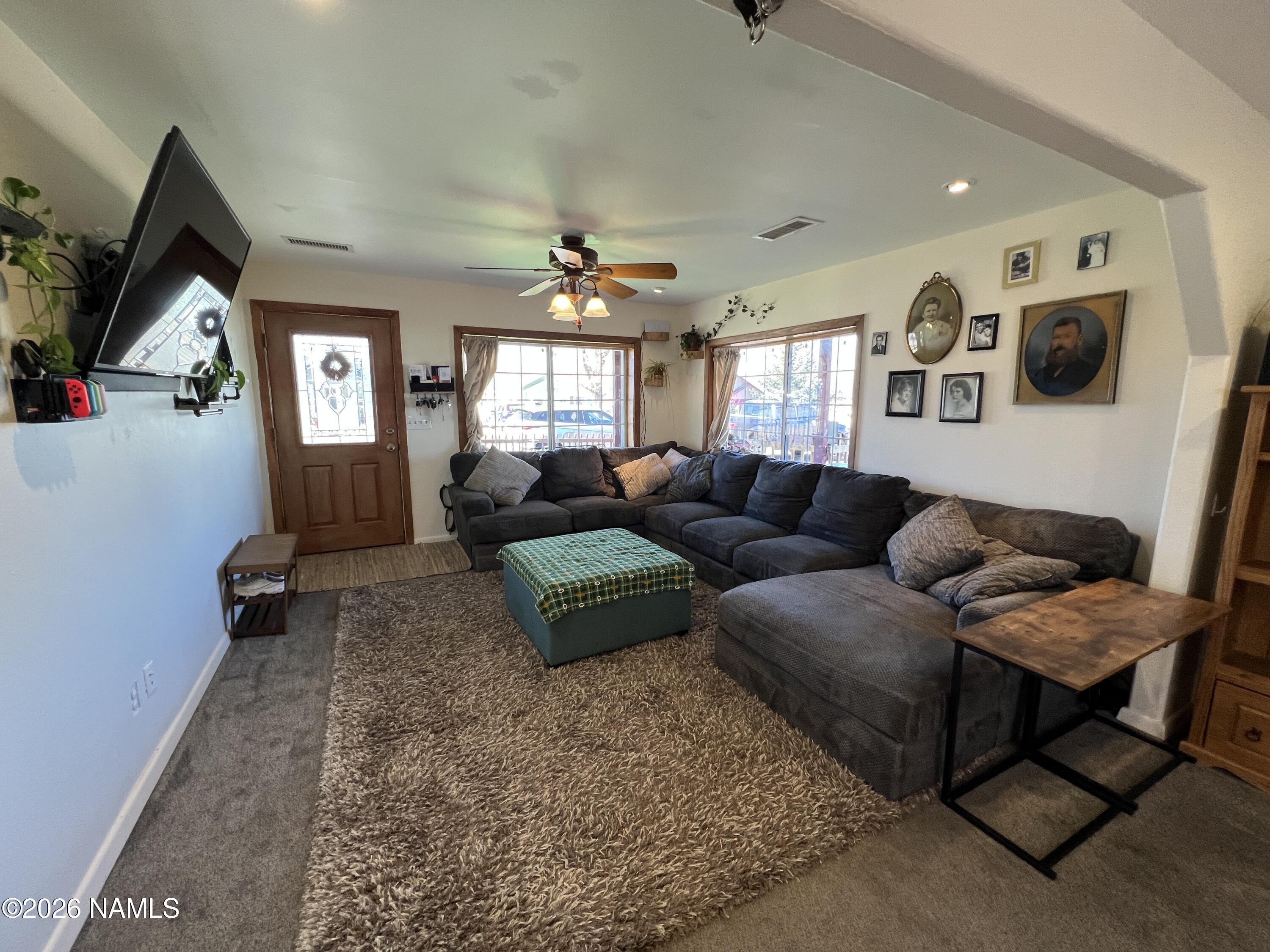 407 South 4th Street Williams, AZ 86046 - Photo 6 of 25 a living room with furniture and a window