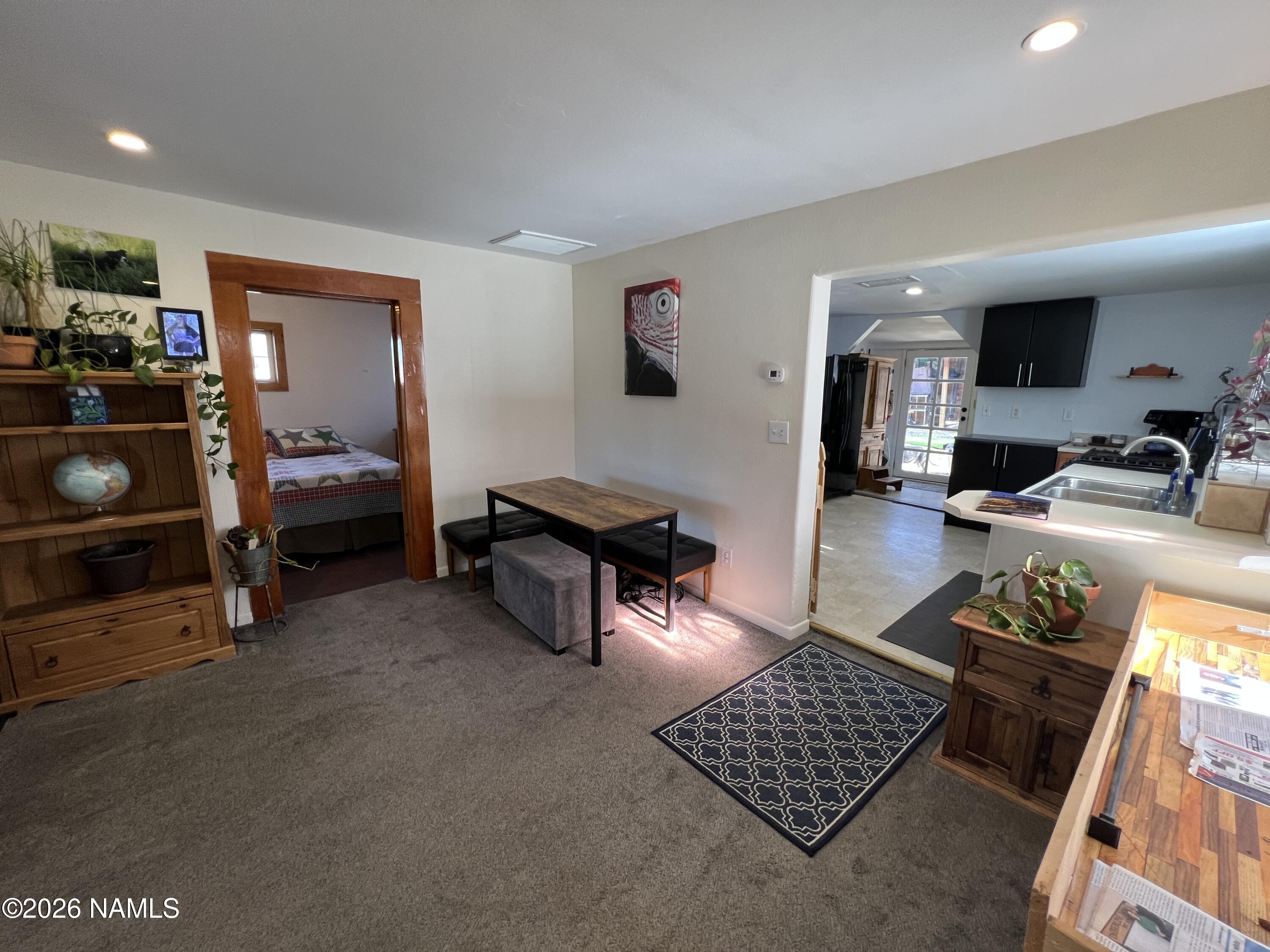 407 South 4th Street Williams, AZ 86046 - Photo 8 of 25 a living room with furniture and a flat screen tv